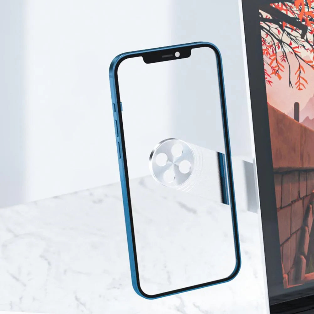 Black adjustable magnetic phone holder clipped to silver laptop showing phone mounted beside screen