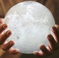 3D printed moon lamp on wooden stand showing touch ring and detailed lunar surface
