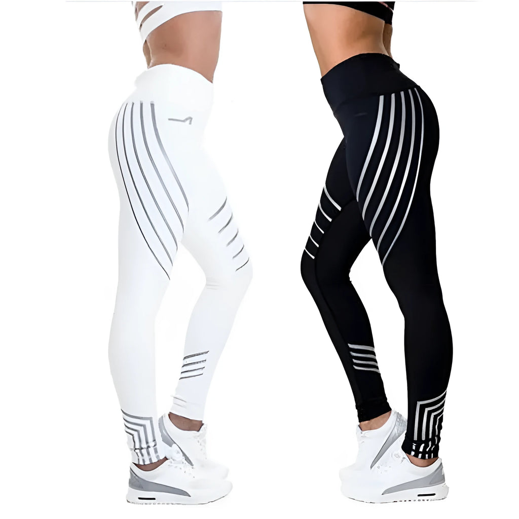Women's black workout leggings with a glowing print, shown in a slim-fit pencil pants style.