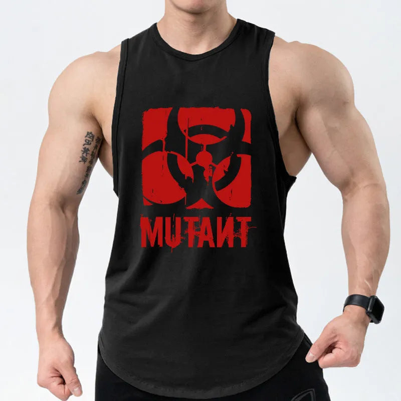Man wearing a loose fit black and yellow sleeveless training vest for gym workouts.