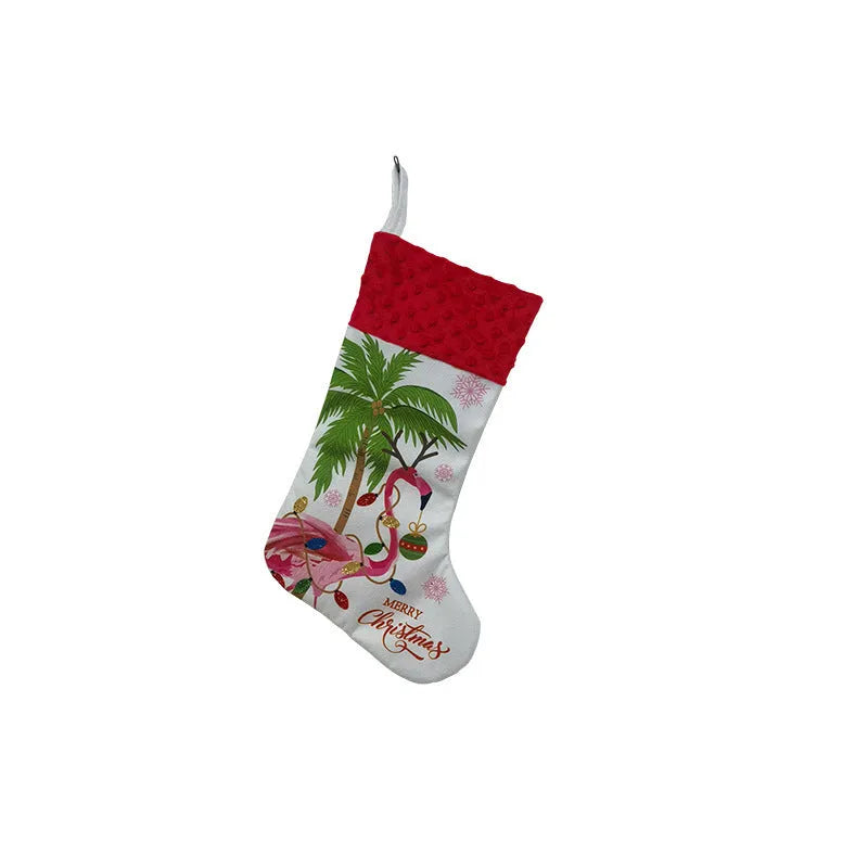 Flamingo Christmas stocking with decorative pendant measuring 46 by 28 centimetres