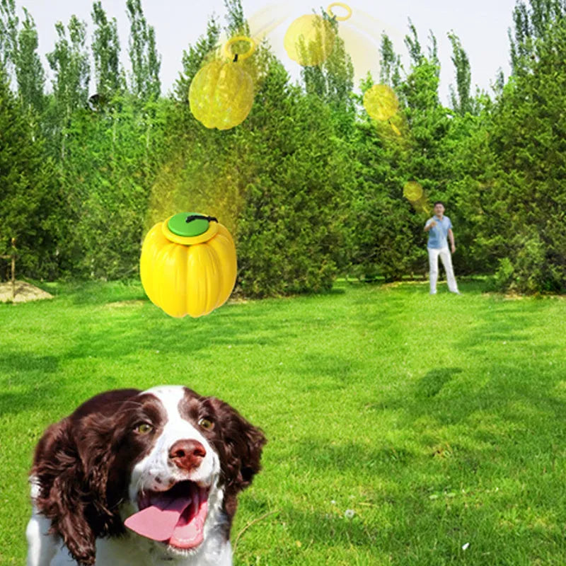 Green, orange, and yellow plastic squeaky pumpkin dog ball toy for small dogs, 68mm diameter.