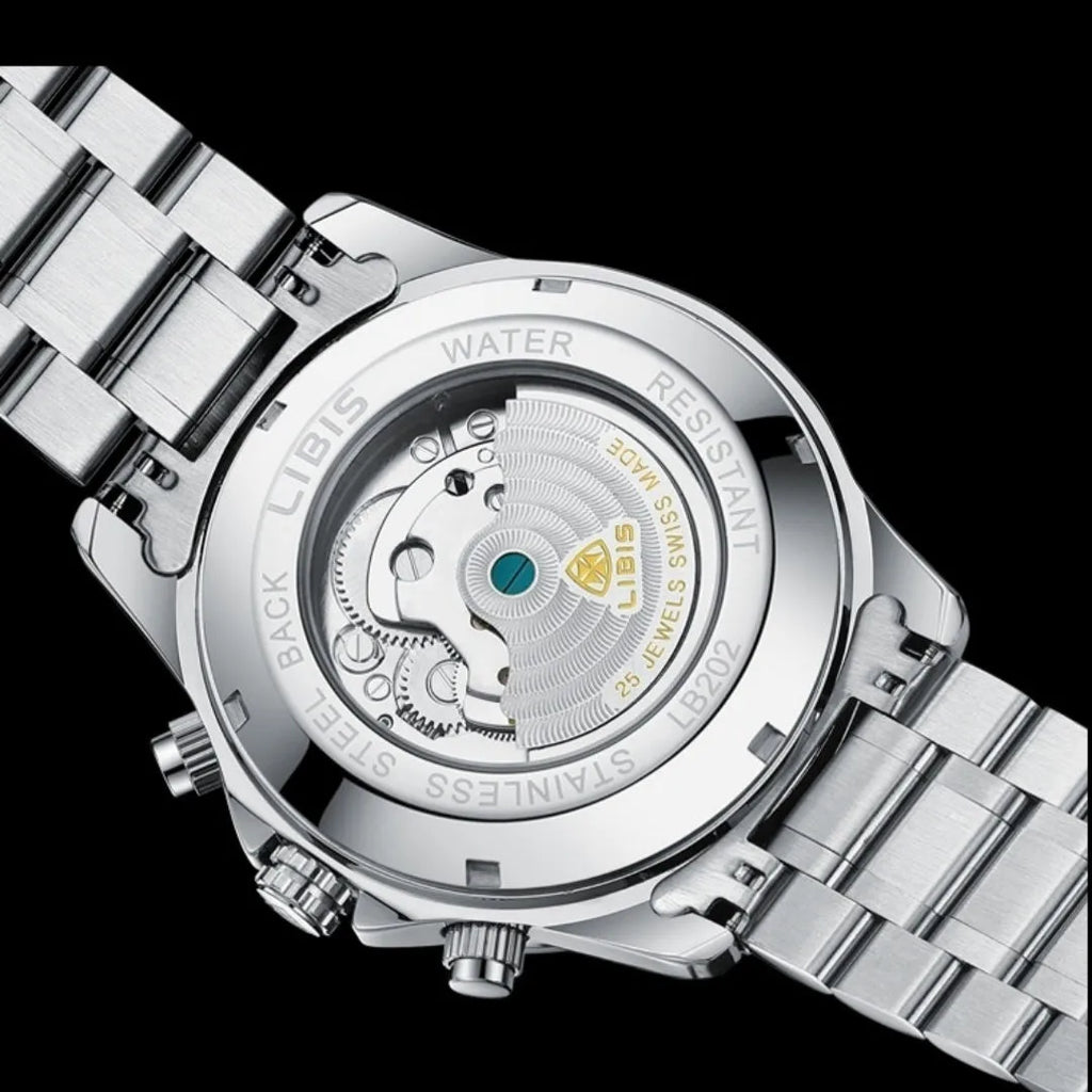 Men's silver automatic perpetual calendar watch with stainless steel strap on wrist.