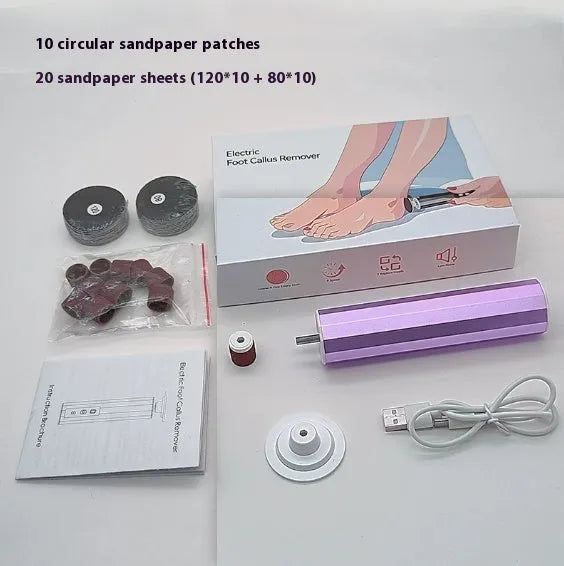 Pink USB-powered electric callus remover tool with sandpaper discs on a table.