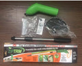 Cordless handheld lawn trimmer with extension pole and protective shield on a garden lawn.