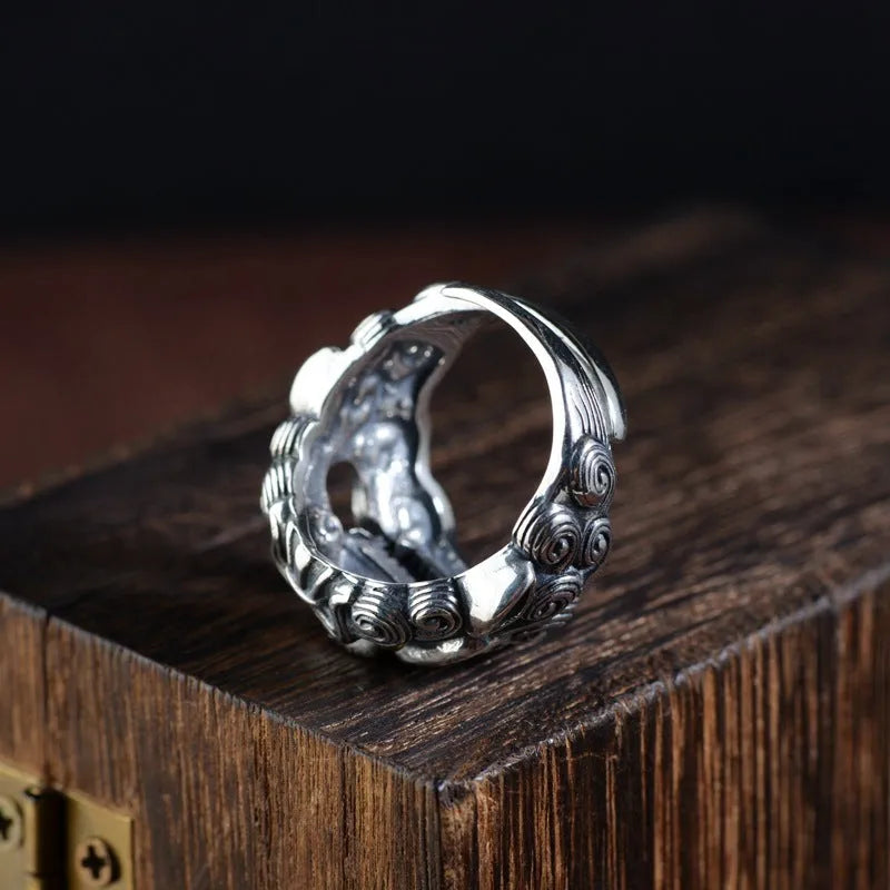 Silver open ring with Jibeast pattern and diamond detailing in retro zodiac design