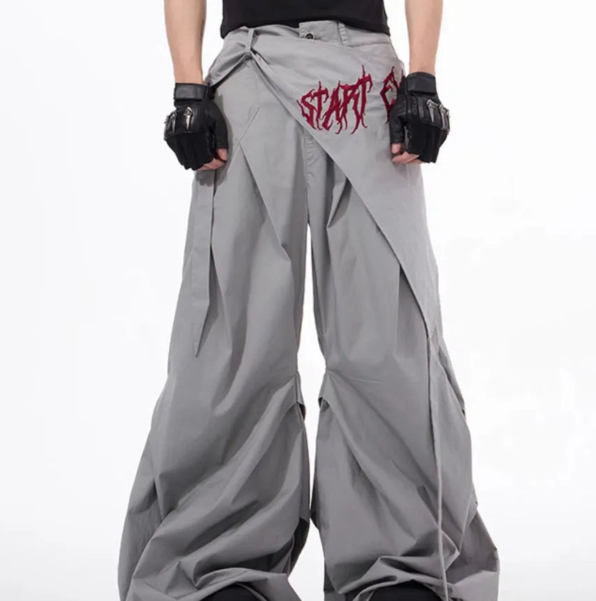 Boys wide-leg Korean style trousers in black and grey colours showing summer functional design