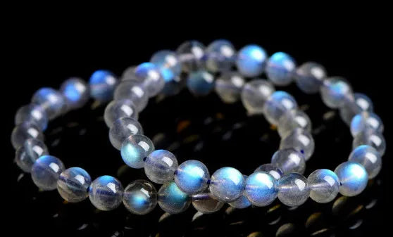 Natural crystal blue moonlight bracelet with grinding treatment showing multiple diameter options on wrist