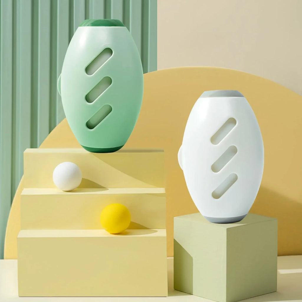 Four green and white washable reusable gel lint roller balls for portable pet hair removal.