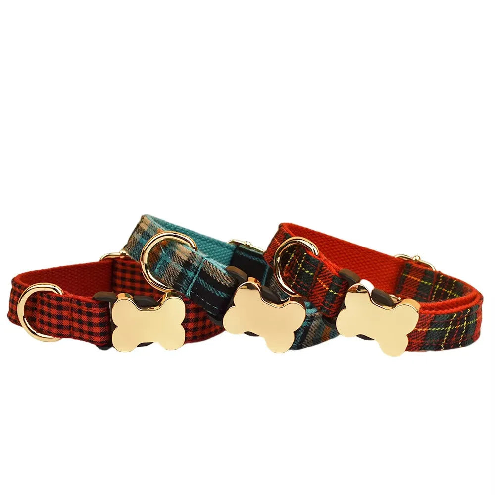 Flat nylon dog collar with a printed grid pattern and a bone-shaped metal buckle in multiple colour options.
