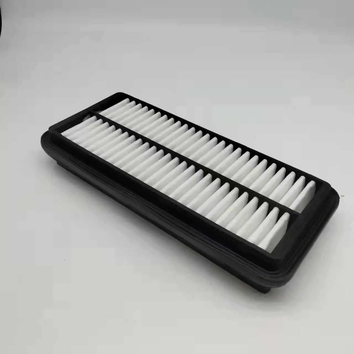 Black automotive air filter for Modern cars with dimensions 256mm by 113mm by 40mm