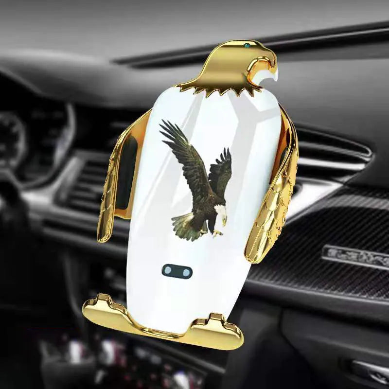 Black and gold wireless charging car phone holder with suction cup mount on a car dashboard.