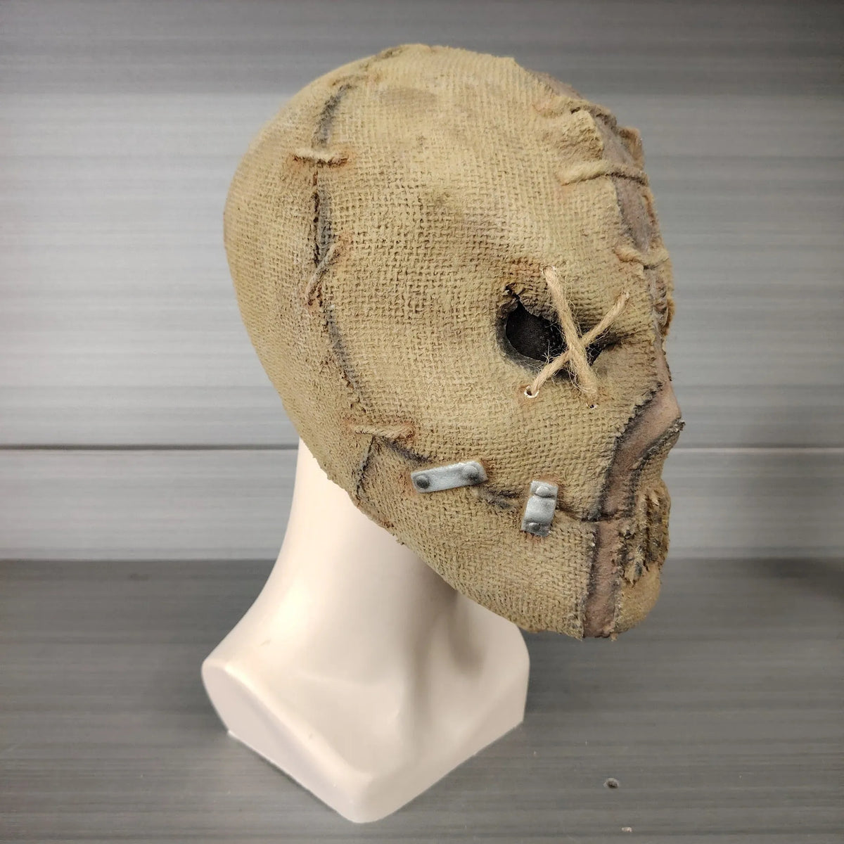 Latex full head horror mask with detailed scar skull design for Halloween costumes.