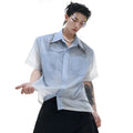 A loose-fitting men's blue to white gradient short-sleeve shirt for casual summer wear.