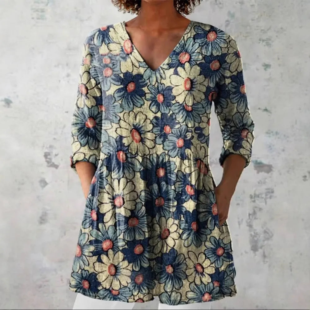 Women's slim fit long-sleeved top with retro digital print design in a colour selection.
