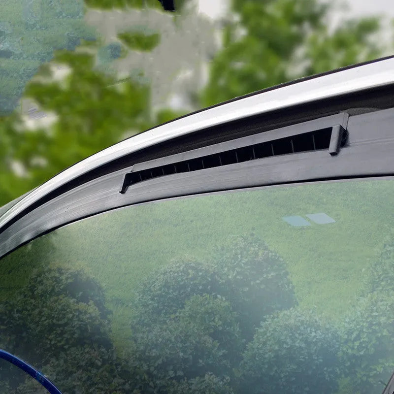Black and white USB car ventilation fan for reducing exhaust odour and heat inside vehicles