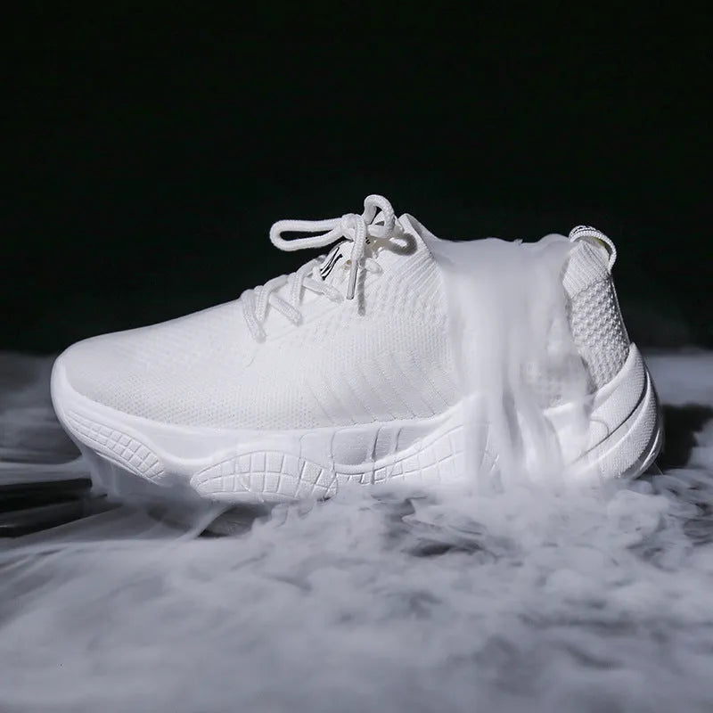 Women's low-top white woven sneakers with thick rubber sole and letter pattern detail