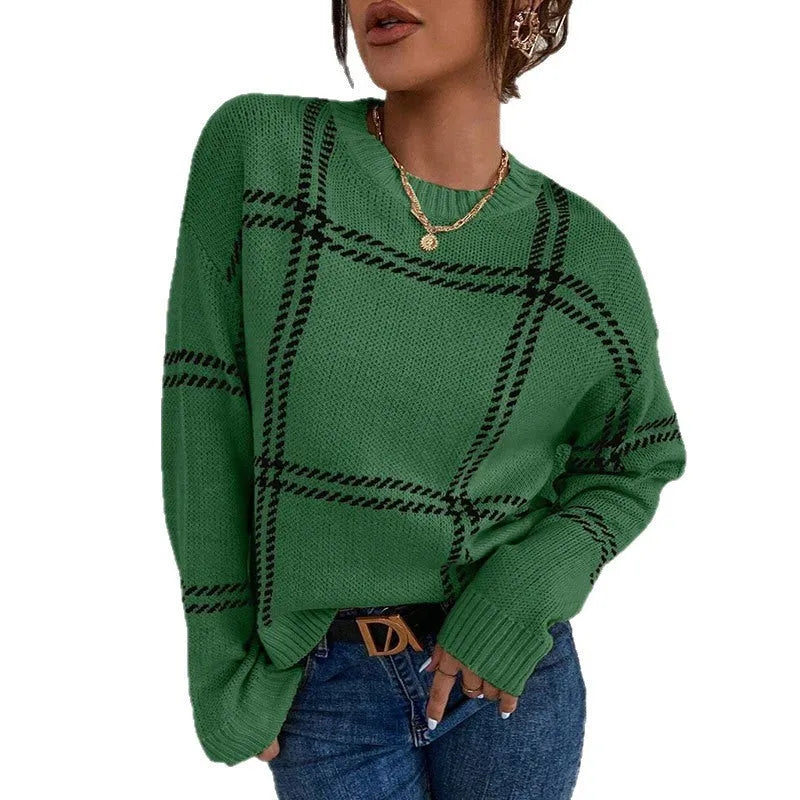 Women's loose-fit plaid sweater with colour-block stripes in acrylic, shown in apricot colour.
