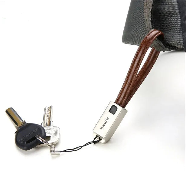 20cm iPhone charging cable with leather wrapping and zinc alloy connector in black, brown or red