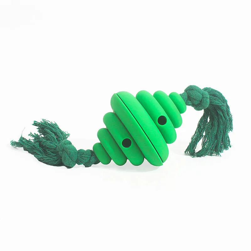 Green and yellow split spiral dog ball with rope attachment for interactive play and treat dispensing