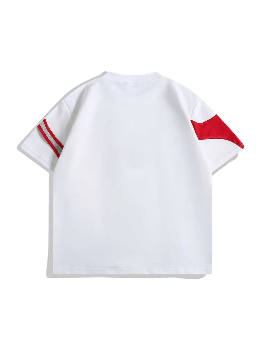 Black and white loose fit t-shirt with padded shoulders and double stitching detail