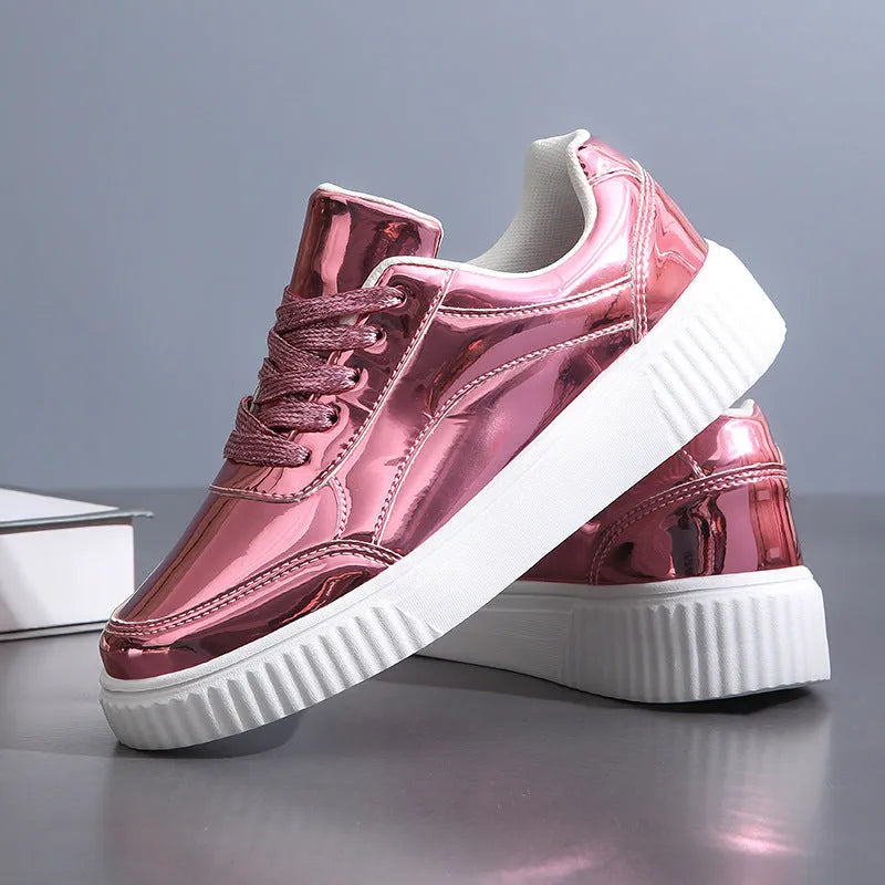 Rose gold and gold sequinned platform sneakers with round toe and thick MD sole.