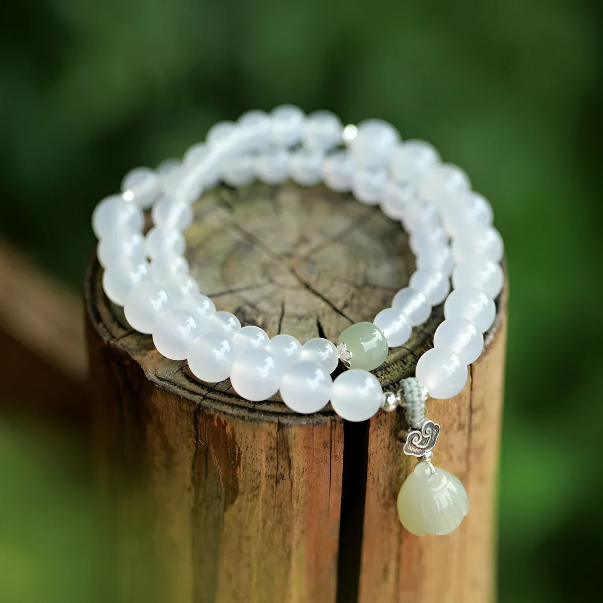 Women's S925 silver bracelet with white agate and Hetian jade stones in geometric lotus pattern