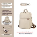 Simple canvas travel women's backpack showing internal laptop compartment and organisation pockets