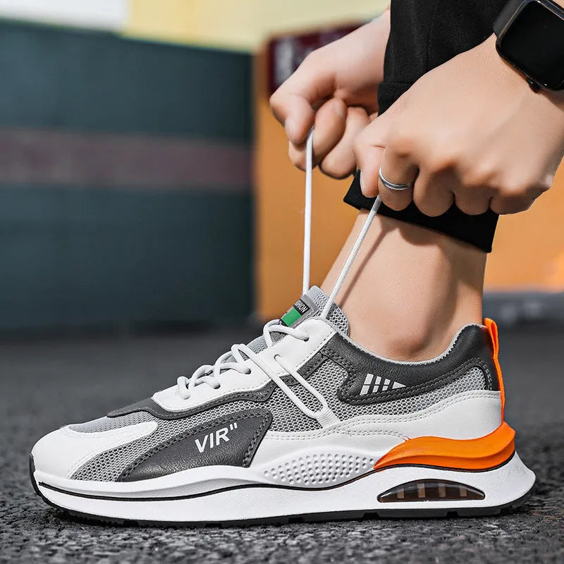 Men's grey mesh casual shoes with round toe and mid-top height design
