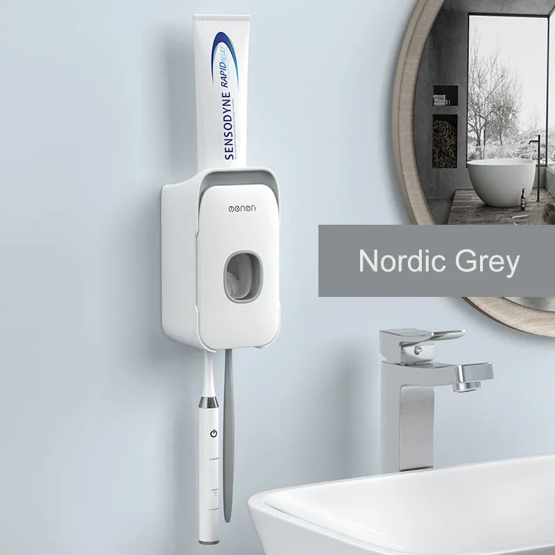 Automatic touchless toothpaste dispenser with digital LCD display mounted on a bathroom wall