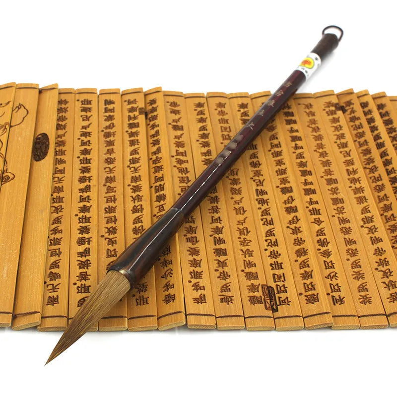 Wolf hair Chinese calligraphy brush with steel rod, shown in large, medium, and small block sizes.