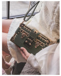Hard structured PU shoulder bag with flap design and metal hasp closure