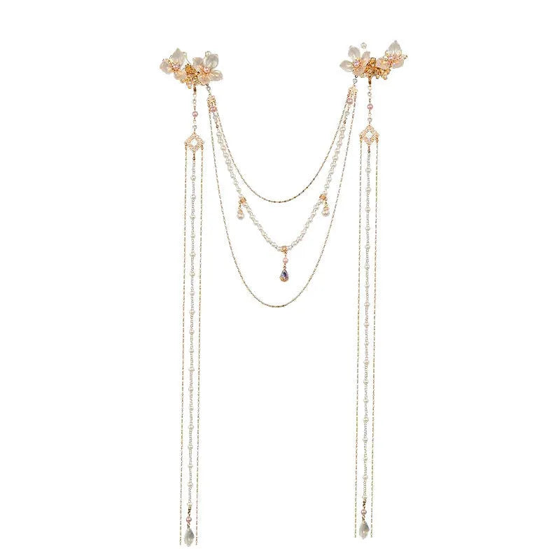 Gold women's hairpin with diamond grip and long tassel design