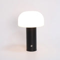 Atmosphere table lamp with USB charging port and plug-in power in black, green, orange, or white colour options