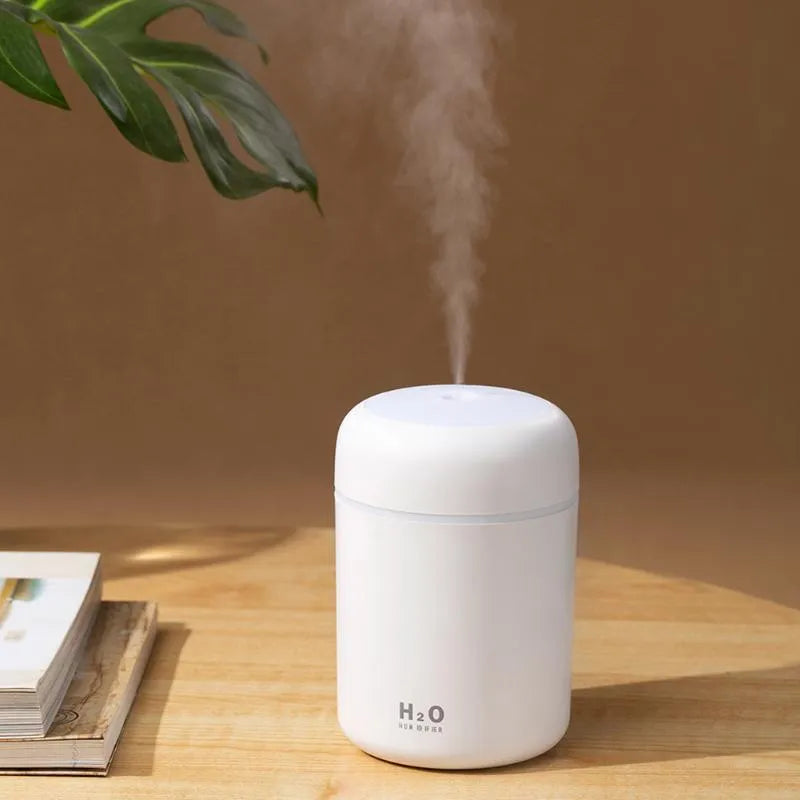 Pink USB desktop humidifier with 300ml water tank and colourful atmosphere lighting