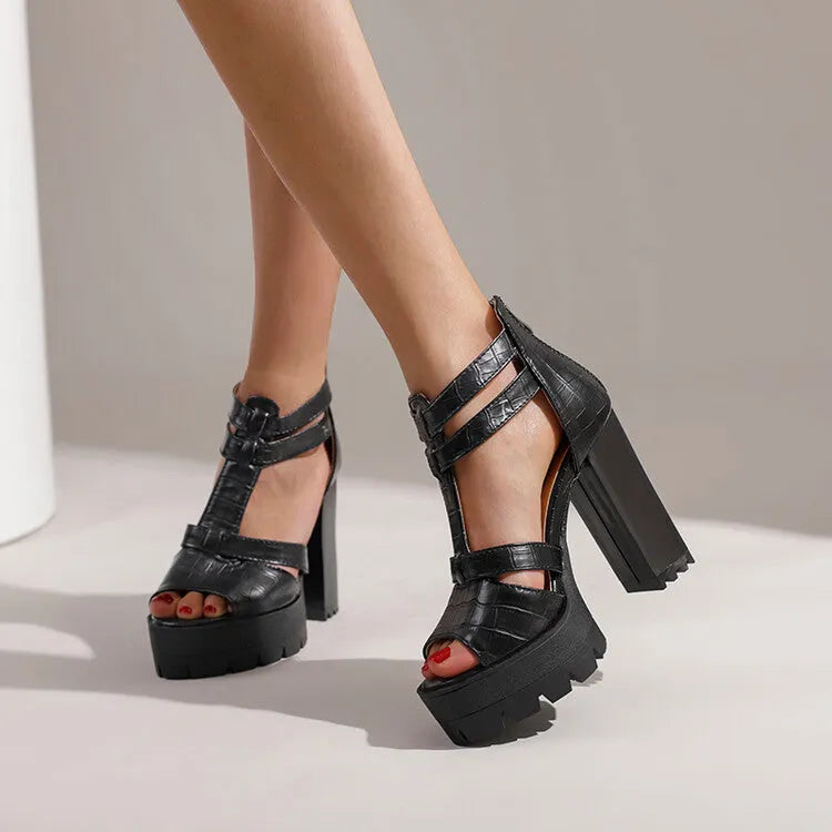 Women's black platform high heel sandals with a back zipper and round toe.