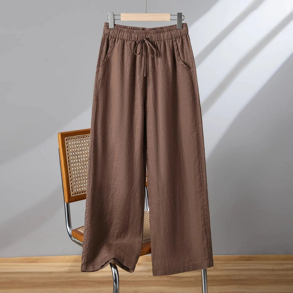 Women's straight-leg casual trousers with elastic waistband and lace-up drawstring detail in four colour options