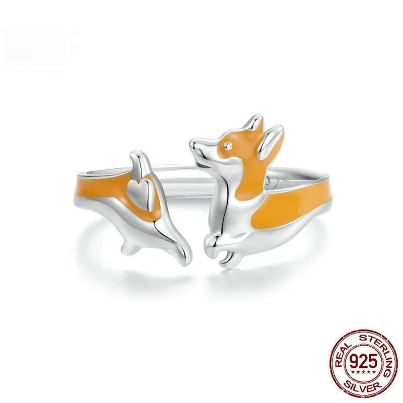 Silver electroplated ring featuring a cartoon corgi dog design in SCR1014-E colour.
