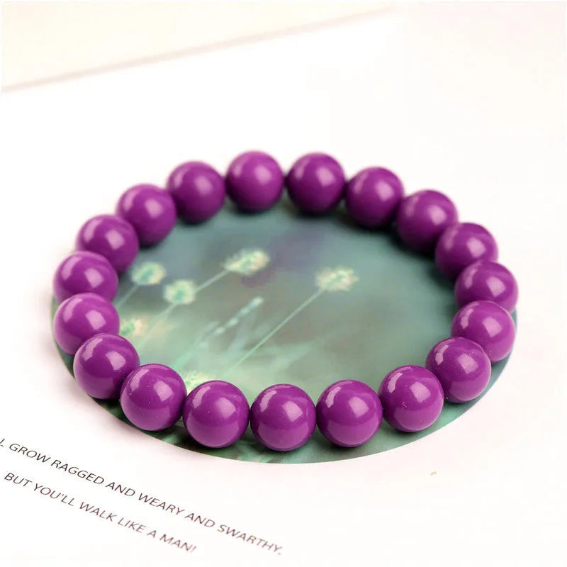 Jiuya polished crystal purple mica bracelet showing beads in an original design on a wrist.