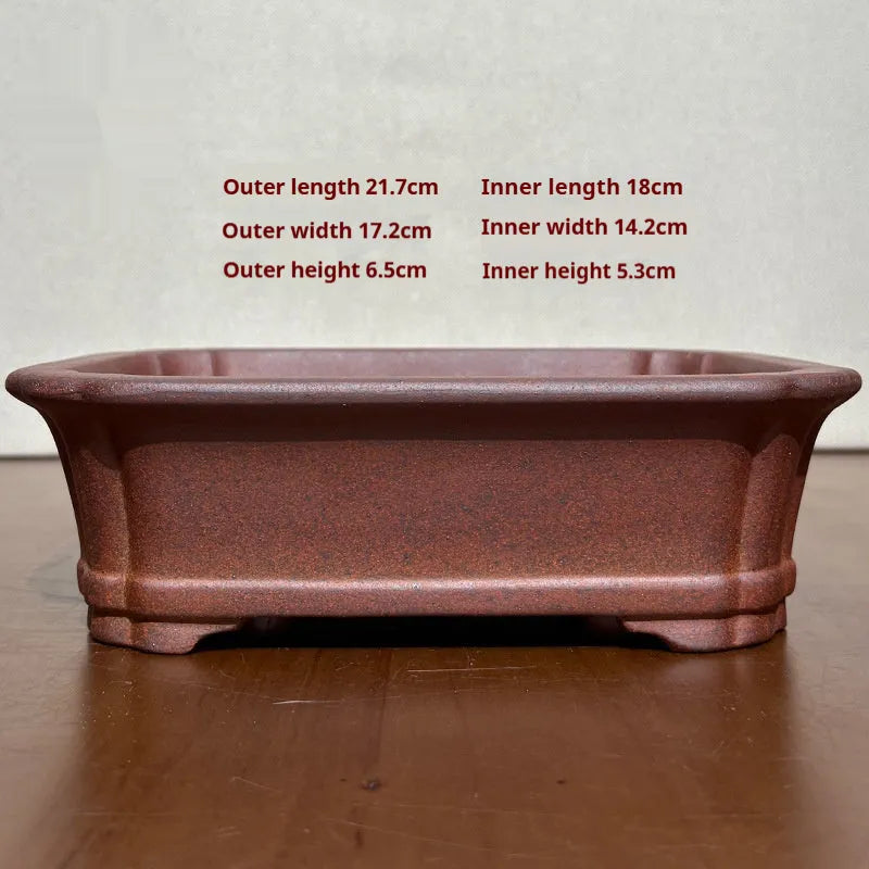 Rectangular stoneware flower pot in reddish brown with hand-glazed finish and 17cm base, for bonsai or firewood display.