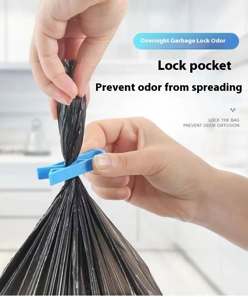 Grey PP plastic non-slip clip for securing bin bags to a rubbish bin rim.