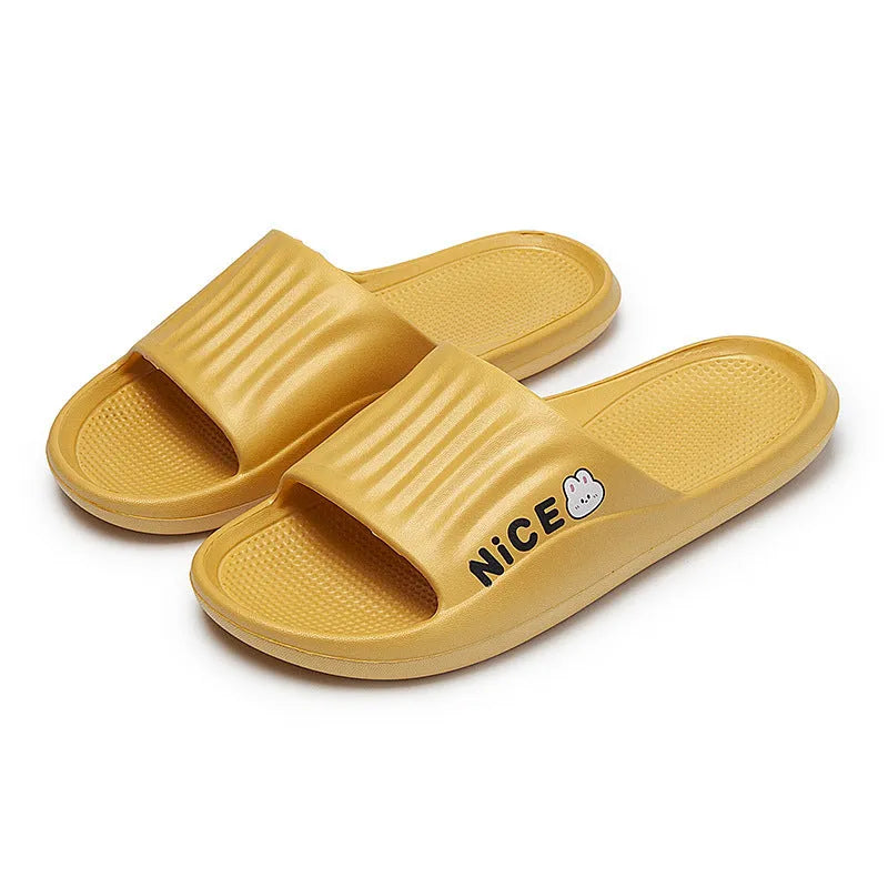 Pair of minimalist cartoon pattern EVA flip flop slippers on a plain background.