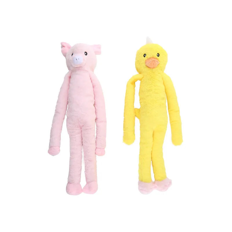Large pink and yellow plush dog toy with squeaky rattle sounds for golden retrievers