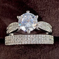 Geometric alloy wedding ring bracelet in white gold colour showing round design elements