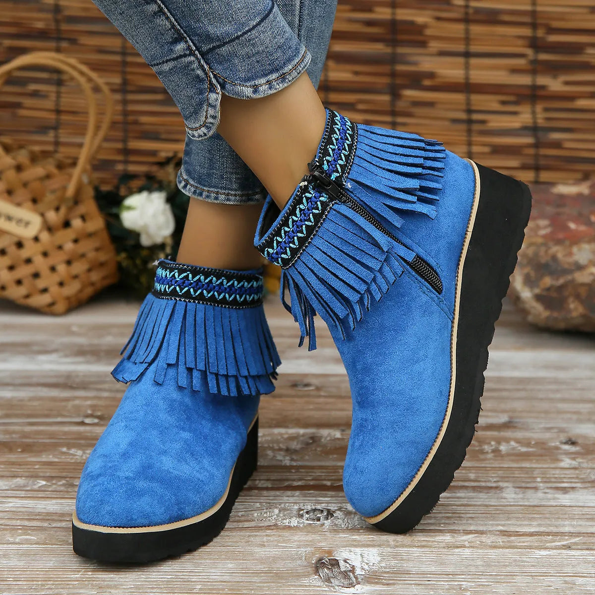 Women's dark brown suede wedge ankle boots with side zip, waterproof platform, and tassel detail.