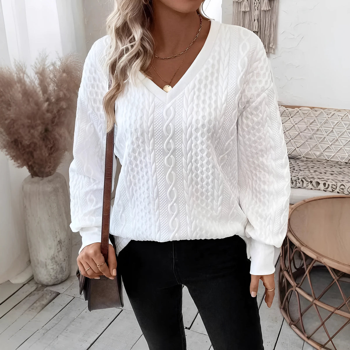Milky white loose fit long sleeve T-shirt with a 3D pattern detail on the front