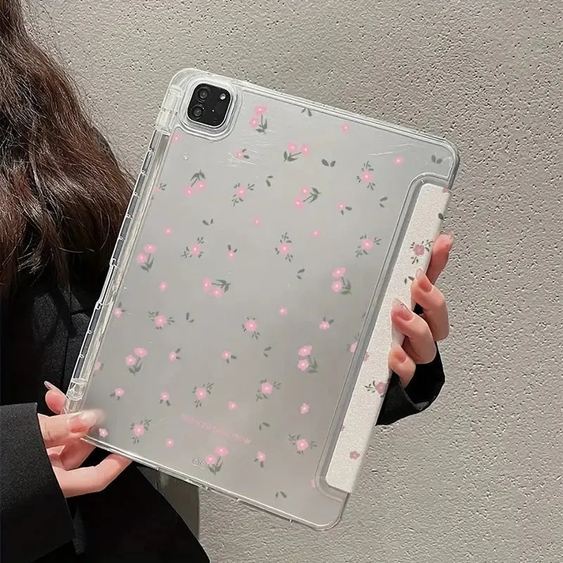 Transparent floral tri-fold iPad protective case showing magnetic stand function.