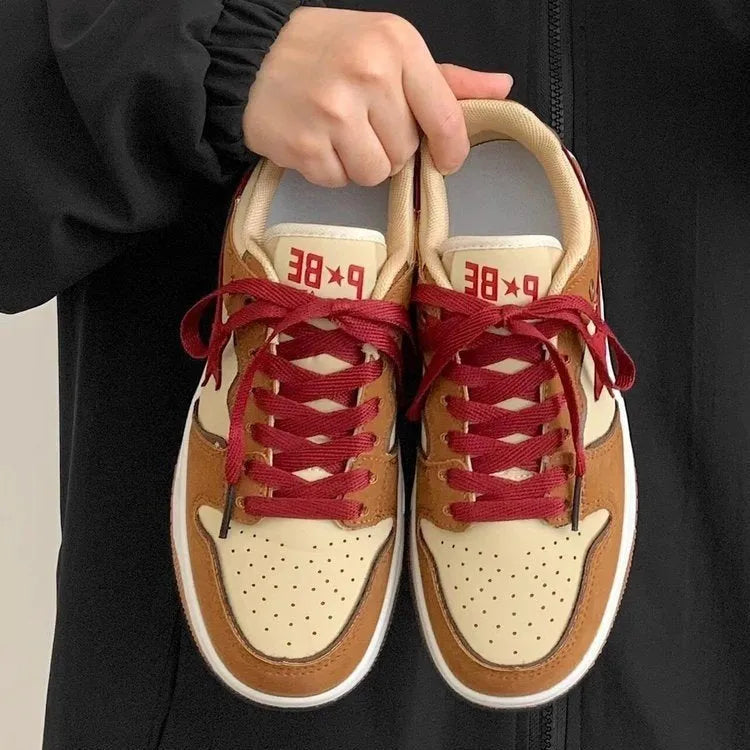 Women's brown platform sneakers with sequin accents and round toe design