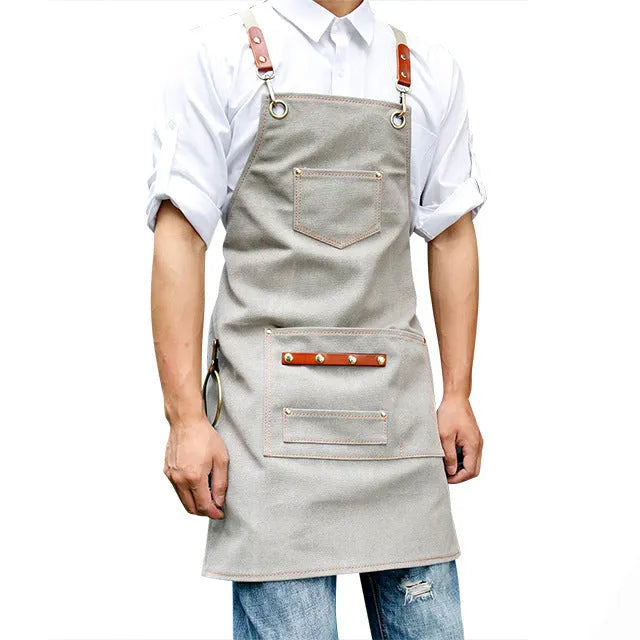 Canvas cross-strap apron in camel colour for cafe or baking work