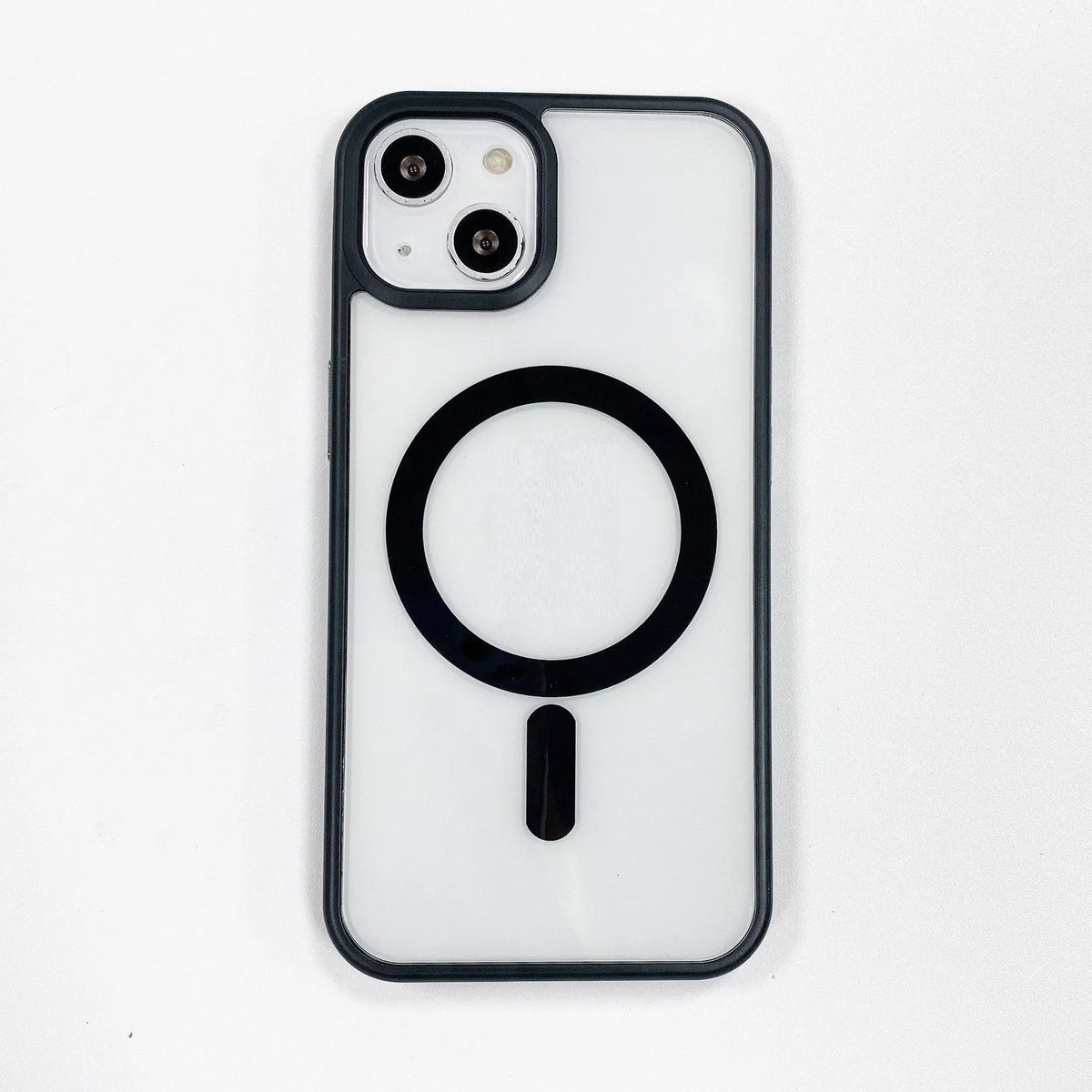 Transparent acrylic MagSafe phone case showing magnetic ring and clear back design